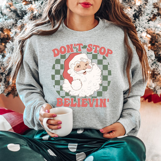 Don't Stop Believin' Santa Checkered | Sweatshirt